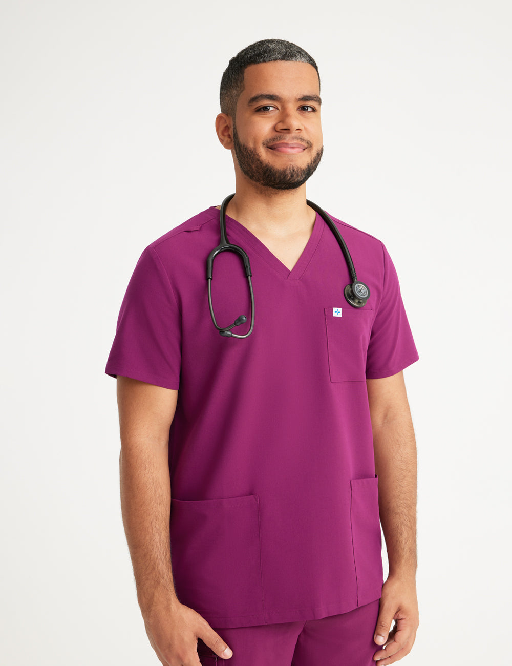 Limited edition men&#39;s scrub top in ceil blue, designed for comfort, practicality, and a sleek V-neck look