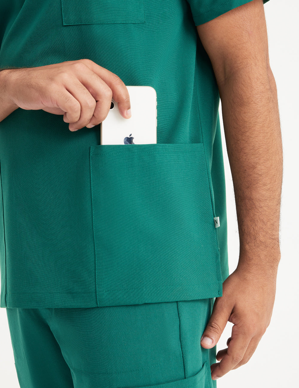 Classic royal blue men&#39;s V-neck scrub top, part of a limited edition collection with three pockets