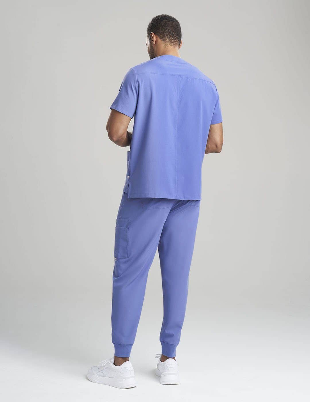 Comfortable ceil blue limited edition V-neck scrub top for men, ideal for everyday professional settings