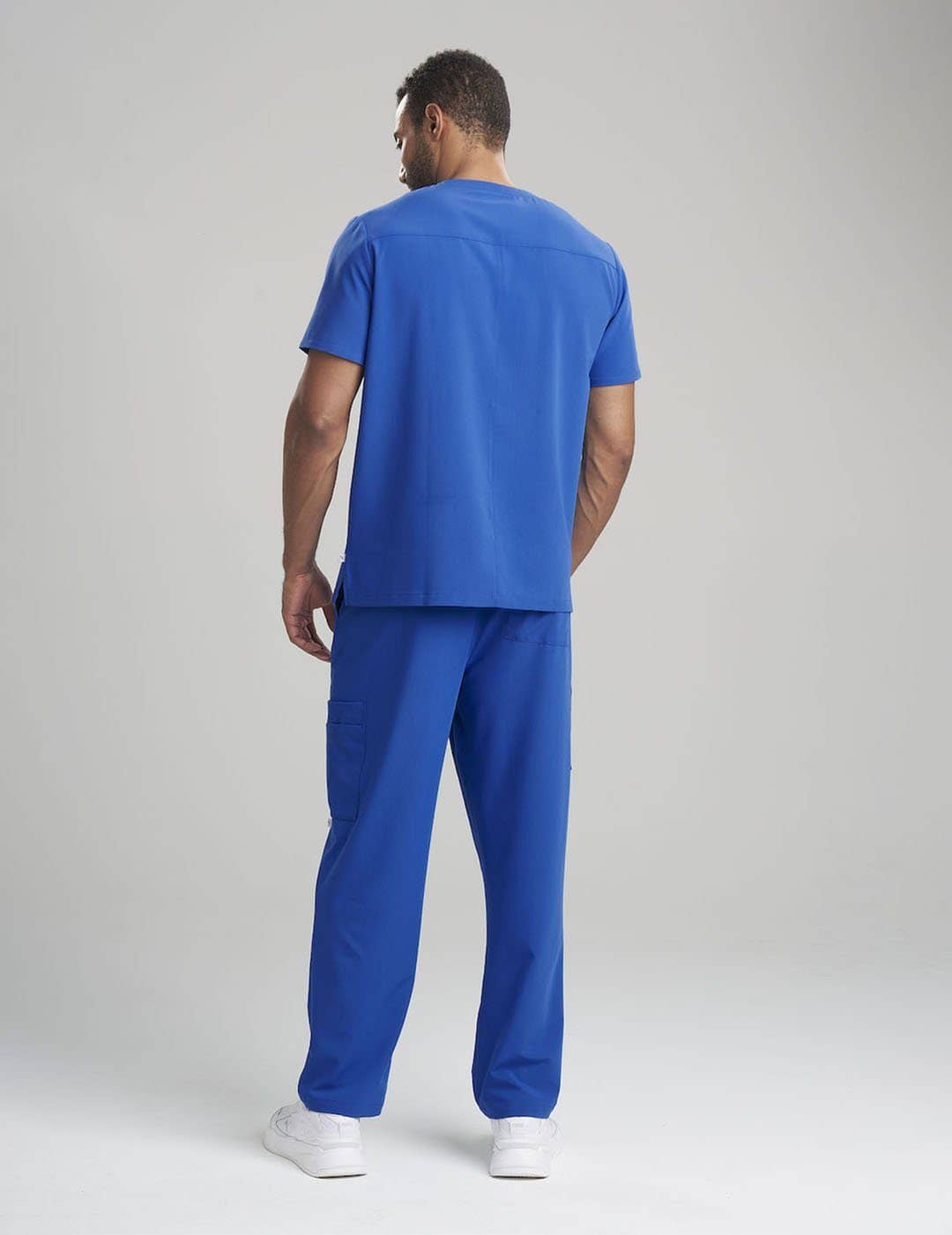 Stylish limited edition ceil blue V-neck scrub top for men, crafted for professional use with three pockets